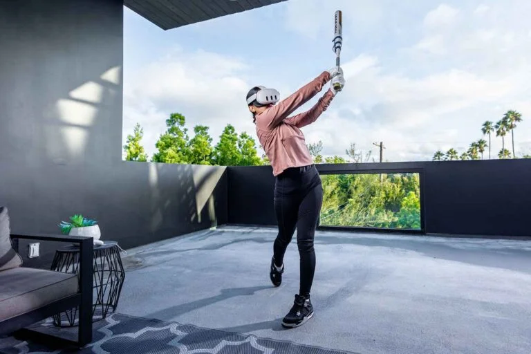 Image of a softball player using WIN Reality VR softball training platform